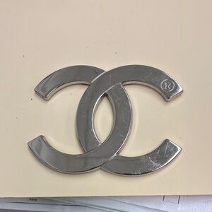 CHANEL Metallic Silver Interlocking Logo Pin